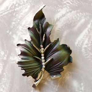 R.S.K. leaf brooch.